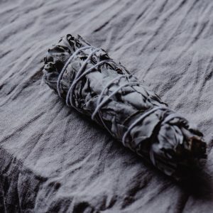 white sage smudge stick on the table